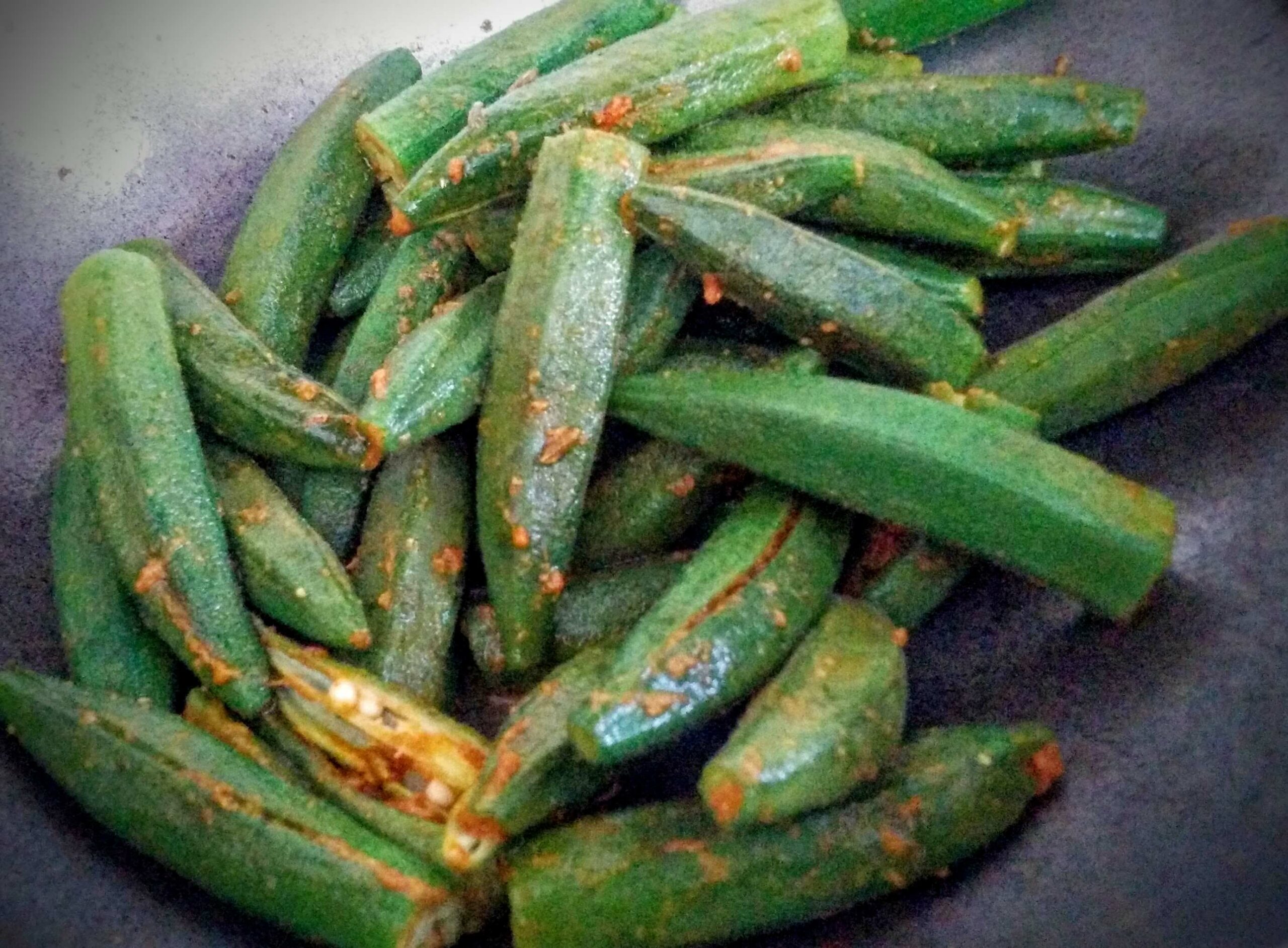 Paneer Stuffed Bhindi In Ajwain Tomato Gravy Recipe