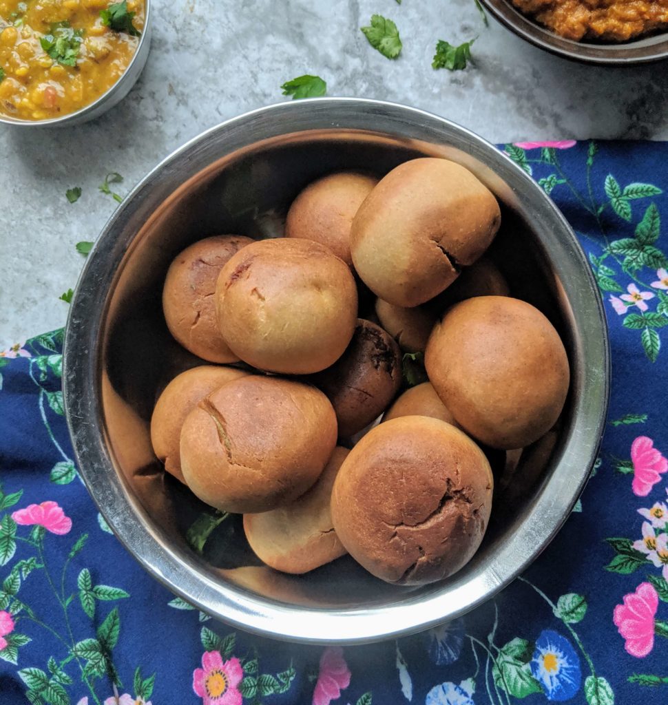 Masala baati is a traditional deep fried or baked bread from Rajasthan made by stuffing dough with a spicy mixture of potatoes & peas.