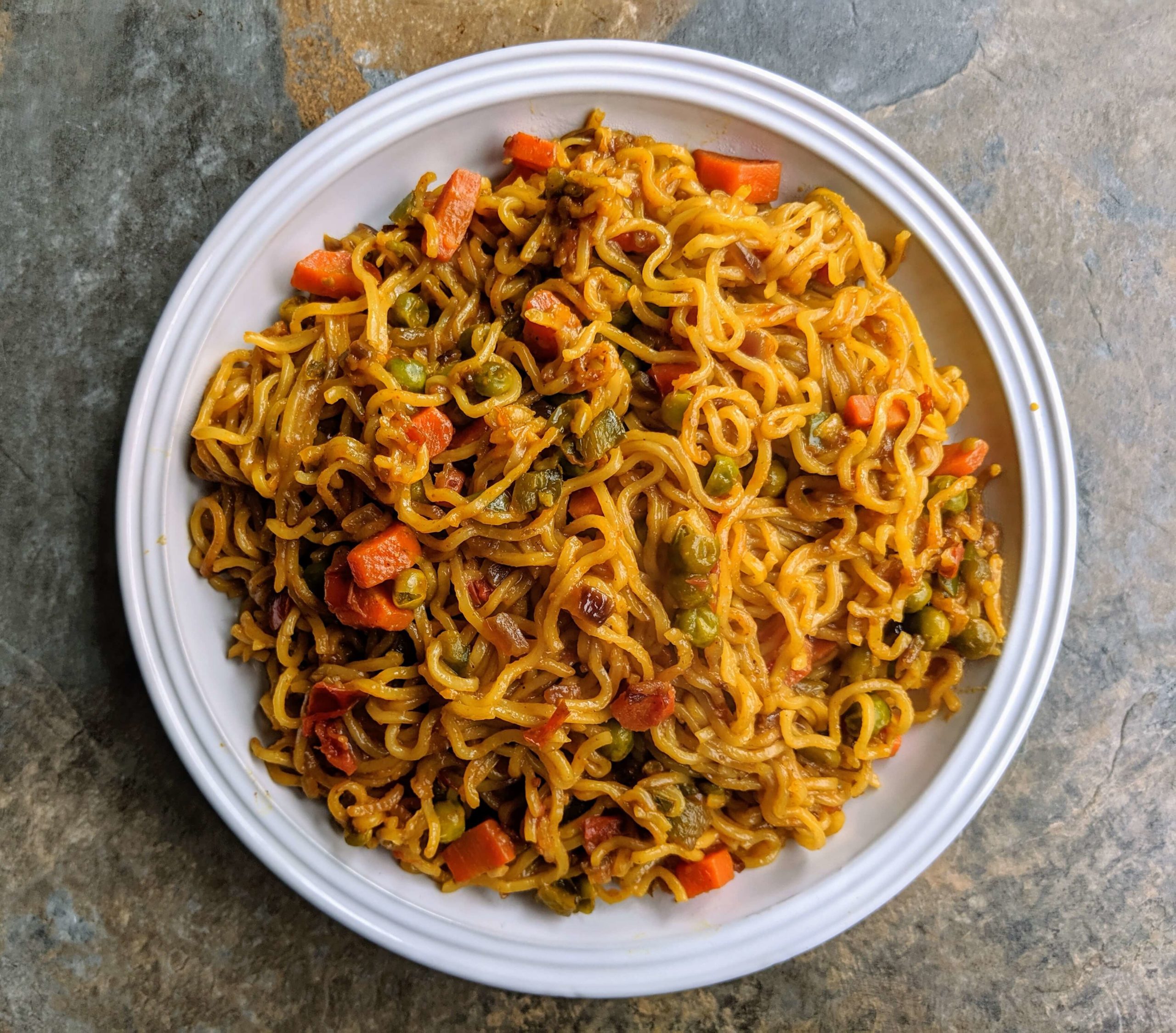 Vegetable Masala Maggi is a healthy twist on maggi noodles made by tossing the noodles along with mixed vegetables and spices.