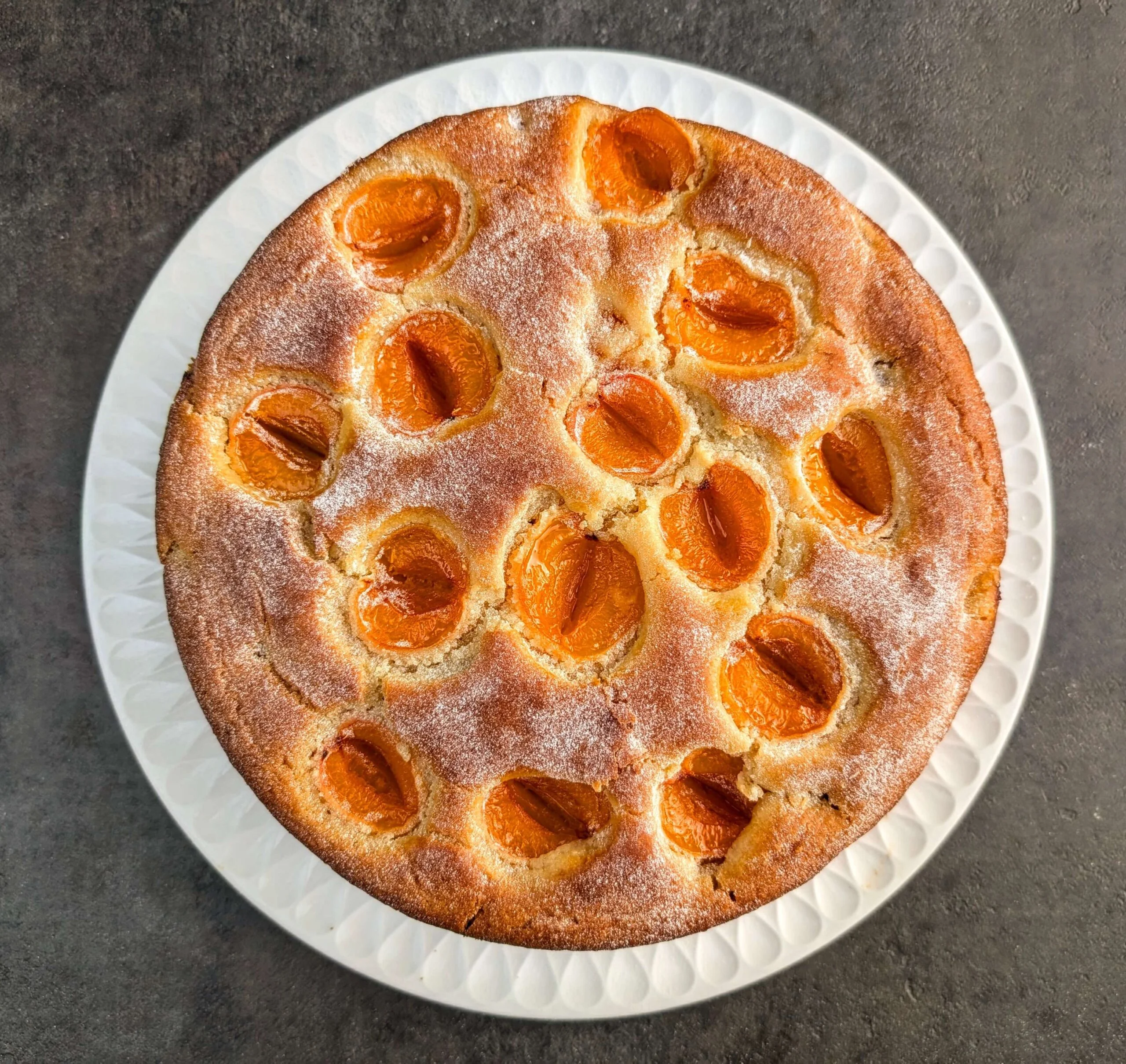 Eggless Apricot Cake Recipe Step By Step Instructions - sprinkle with powdered sugar