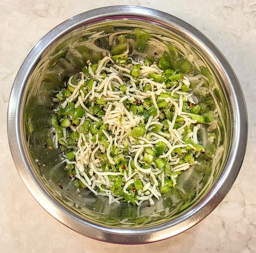 Cheese, capsicum and spices mixed together into a thick sandwich filling.
